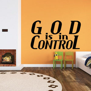 Black wall decal reading 'God is in Control' with large 'GOD' letters.
