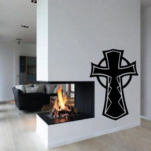 Black gothic cross decal with outlined tribal-style arms and shield center.