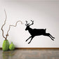 Black jumping reindeer wall decal with outstretched antlers and legs