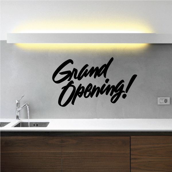 Grand Opening wall decal with black script text "Grand Opening!"