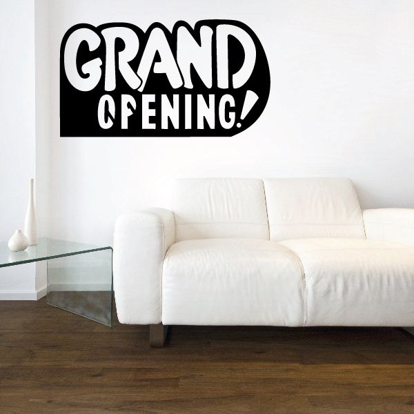Grand opening vinyl wall decal with bold black and white text