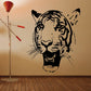 Tiger head wall decal in black line art with detailed stripes and whiskers.