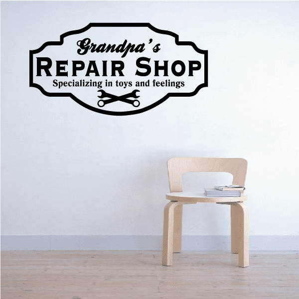 Garage-style wall decal with bold Repair Shop text and crossed tool graphic
