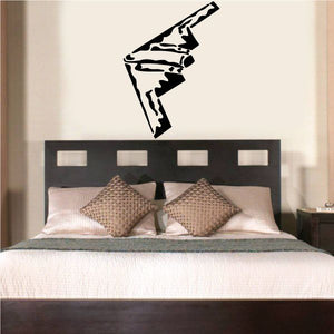 Black and white spirit graphic wall decal on wall above bed headboard