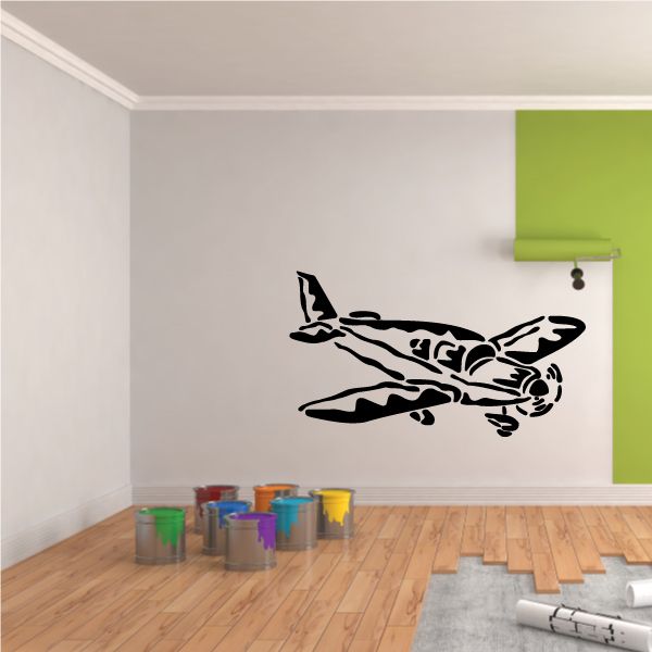 Black propeller plane landing graphic decal