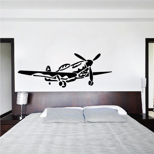 Image of Graphic Propellor Fighter Plane Landing Decal