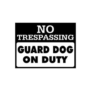 Rectangular vinyl decal sign with bold text: NO TRESPASSING, GUARD DOG ON DUTY