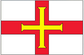 Rectangular sticker featuring the Guernsey flag: red cross with yellow outline on white and red.