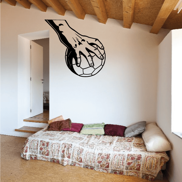 Black hand grip wall decal with rugby ball graphic