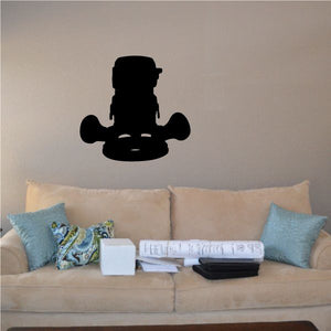 Black handheld router wall decal silhouette with rounded base and side handles