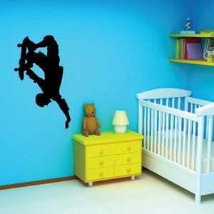 Skateboarding handplant decal with black silhouette of skater mid-move