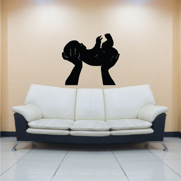 Black silhouette hands holding baby decal