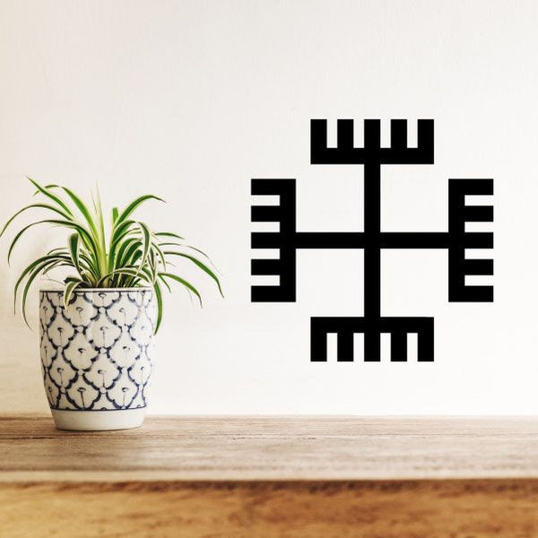 Black geometric cross decal with stacked line and block patterns