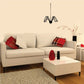 Hanging spider decal with black web-like legs on a wall above a sofa