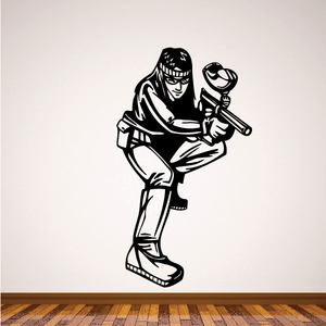 Paintball player decal: smiling player aiming a paintball marker, black-and-white