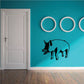 Black pig wall decal with two figures and curly tail