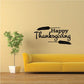 Happy Thanksgiving wheat framing wall decal with black lettering and wheat accents