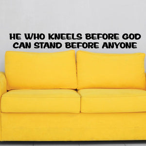 Black wall decal with quote: "He who kneels before god can stand before anyone"