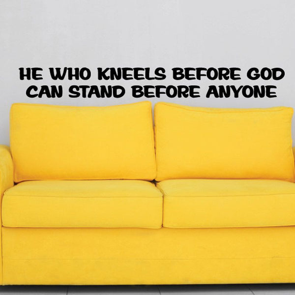 Black wall decal with quote: "He who kneels before god can stand before anyone"