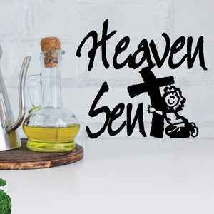 Black lettering wall decal reading "Heaven Sent" and "Sun"
