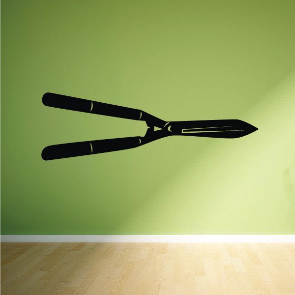 Black hedge clippers decal with two long blades and angled handle