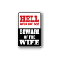 Vinyl sticker with red and white text: “HELL WITH THE DOG” and “BEWARE OF THE WIFE”