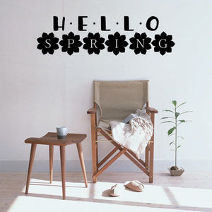 Hello Spring wall decal with black cutout letters and heart-shaped accents