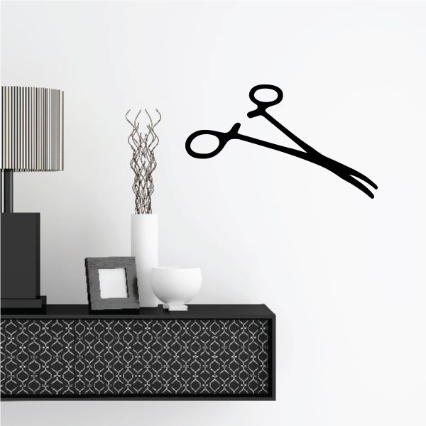 Black hemostat clamp wall decal with looped handle and rod