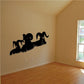 Ram herd wall decal in black with leaping silhouette figures along a horizontal line