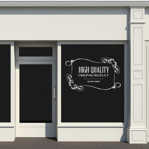 Vinyl wall decal with ornate frame and white text on dark background