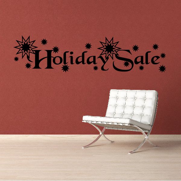 Holiday Sale vinyl wall decal with starburst and small fireworks accents