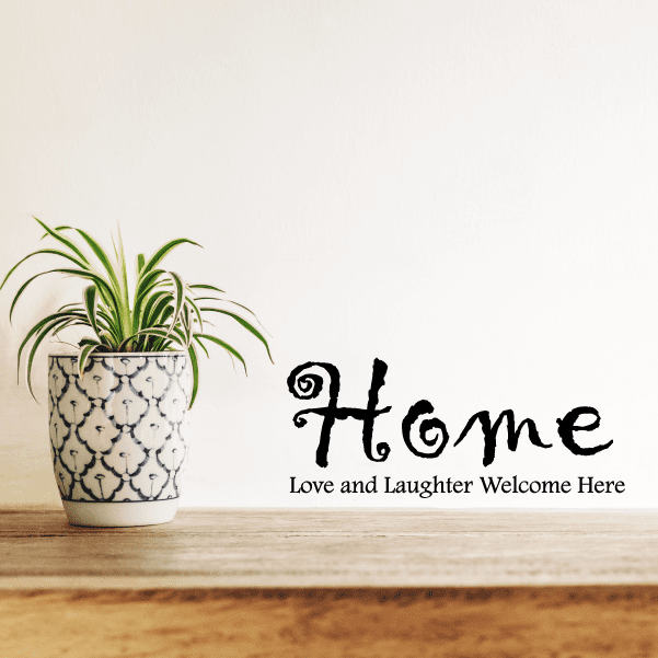 Home wall decal with ornate letters and phrase 'Love and Laughter Welcome Here'