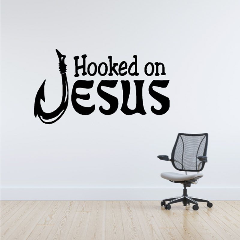 Black "Hooked on Jesus" wall decal with hook icon