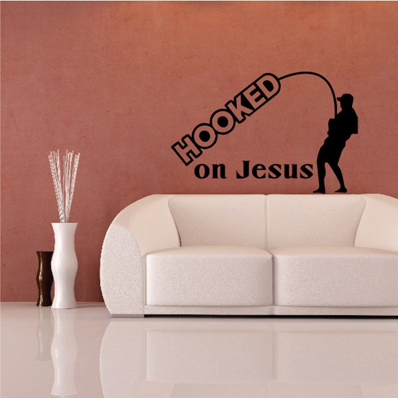 Fishing wall decal featuring Hooked on Jesus text and black fisherman silhouette