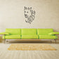 Horned wild cat head decal, black outline on wall