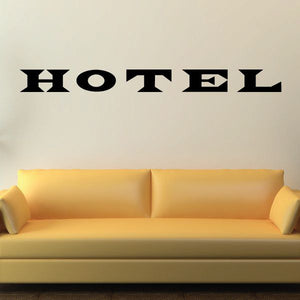 Hotel wall decal vinyl lettering in black, bold block type