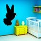 Black hovering pigeon wall decal with wings spread
