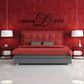 Wall decal reading "How He Loves" in black ornate script and serif letters