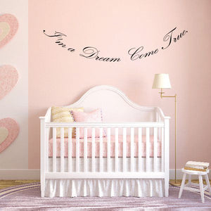 Wall decal text “I’m a Dream Come True!” in black cursive