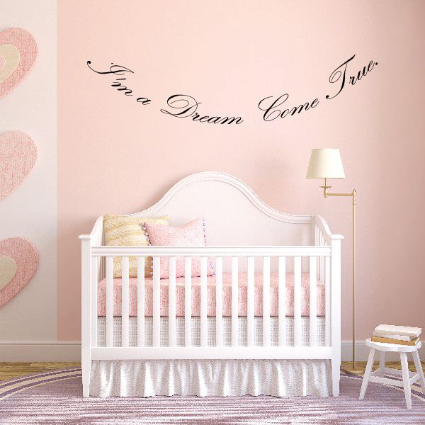 Wall decal text “I’m a Dream Come True!” in black cursive