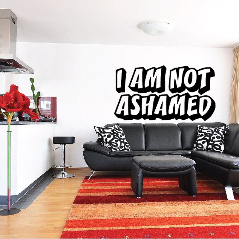 Black and white wall decal with bold text 'I AM NOT ASHAMED'