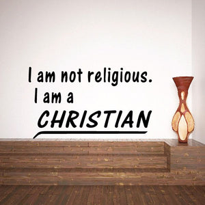 Christian wall decal text: I am not religious, I am a CHRISTIAN, with hourglass