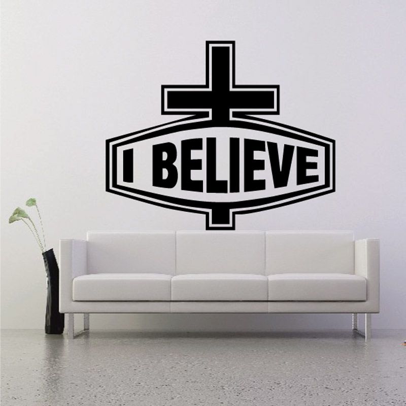 Black cross wall decal with 'I BELIEVE' lettering inside banner