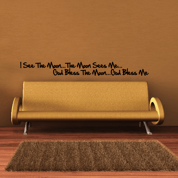 Wall decal with black moon-and-blessing lettering: 'I see the moon... God bless me'