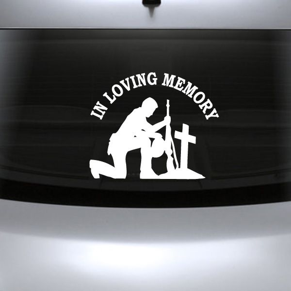 Custom car decal with white kneeling soldier holding a cross and “In Loving Memory” text