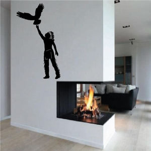 Black vinyl wall decal of a man holding a flying bird silhouette