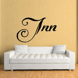 Vinyl wall decal with Inn script lettering in black