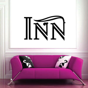Black vinyl wall decal with large INN lettering logo