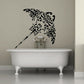 Ornate black stingray wall decal with decorative filigree and flowing tail