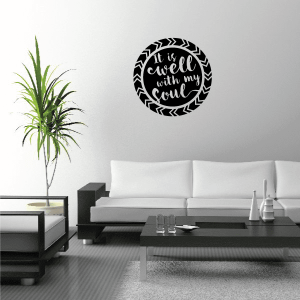 Black circle wall decal with white script 'It is well with my soul'